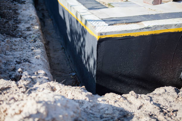 Professional Waterproofing technician working in Marlboro, NJ